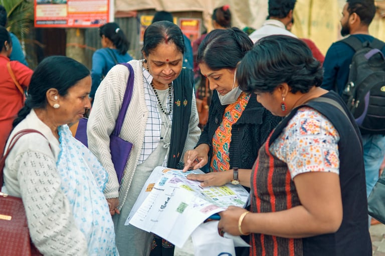 Group of women looking at a guide map together
